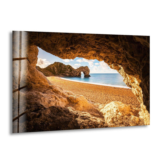 High-quality glass wall art decor enhances this golden beach cave view landscape, showcasing the rich texture and vibrant colors of the coastal scene.