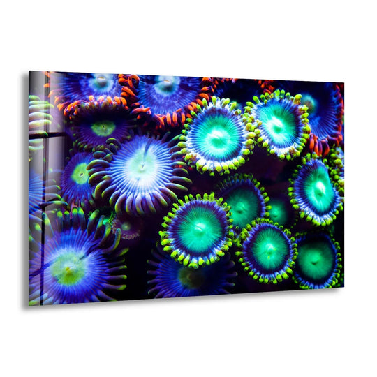 Textured glass art reveals the bioluminescent coral bloom's intricate surface details and vivid glow with a striking underwater aesthetic.
