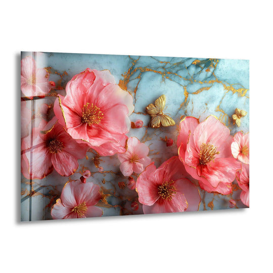 Warm-toned pink and gold floral glass wall art with a cool, light blue marbling creates an elegant home decoration.