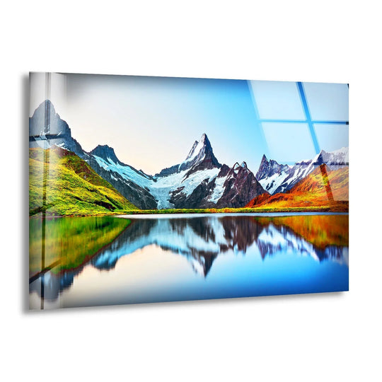 Brilliant color saturation highlights this sunrise landscape on mountain glass wall art, offering the best glass art with a vibrant and scenic view.
