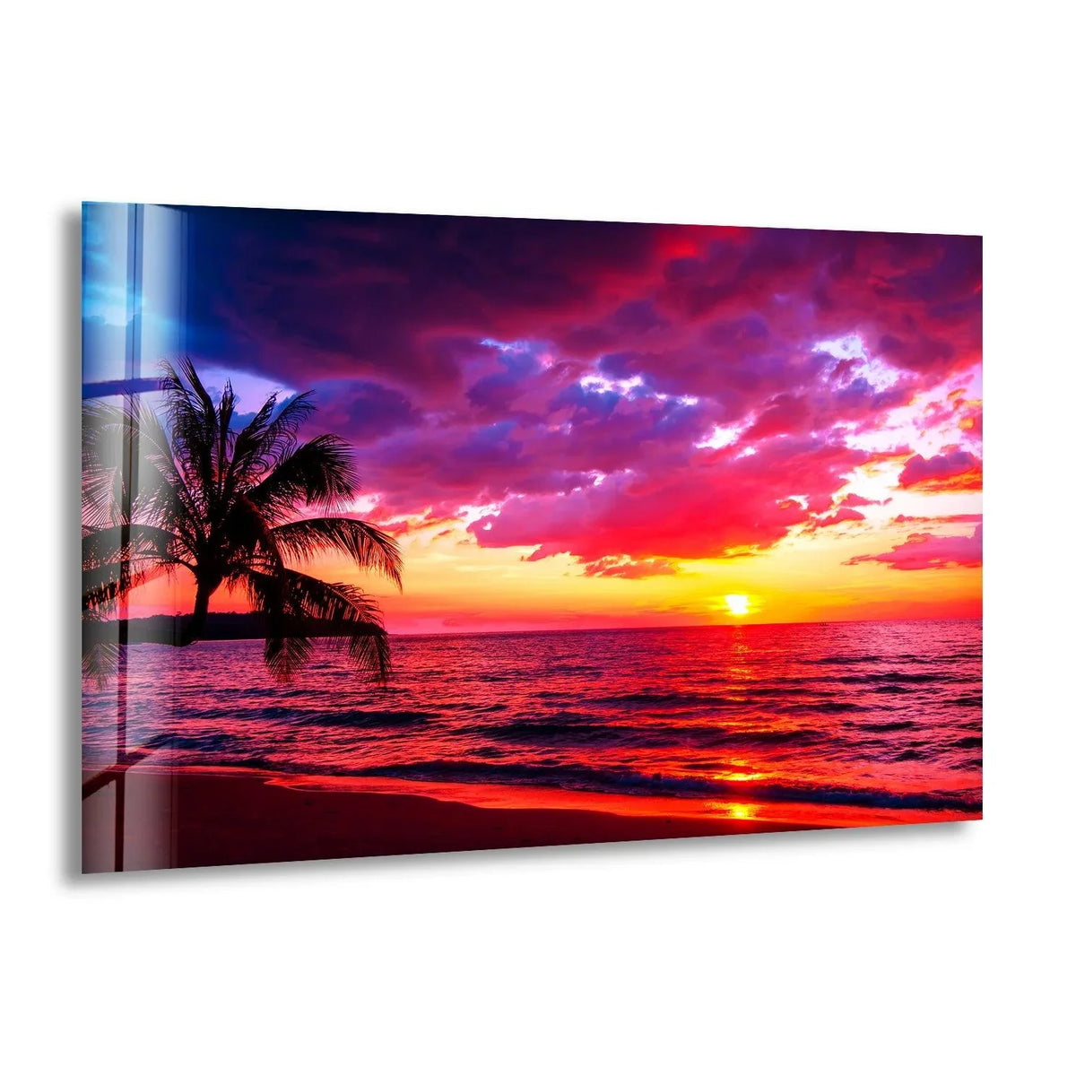 Brilliant crimson light and decorative wall art meet in this stunning sunset red landscape glass wall art, illuminating the ocean's surf and dramatic clouds.