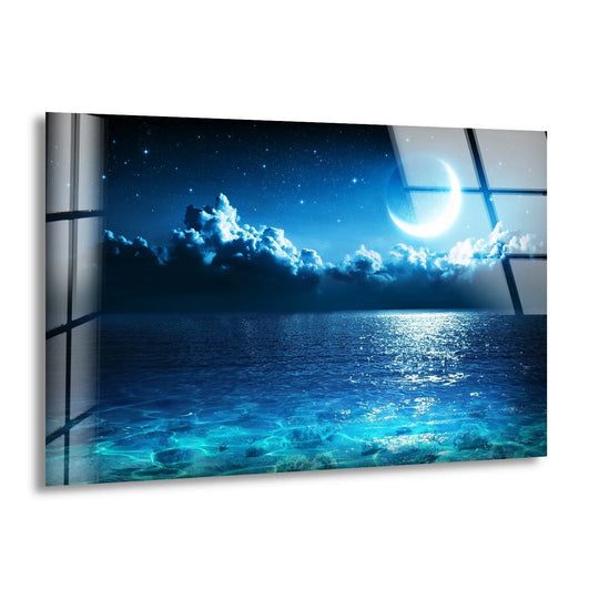 Showing the depth and layers of the Night Sky with Stars glass decorative wall art, reflecting a celestial scene above a shimmering, serene seascape.