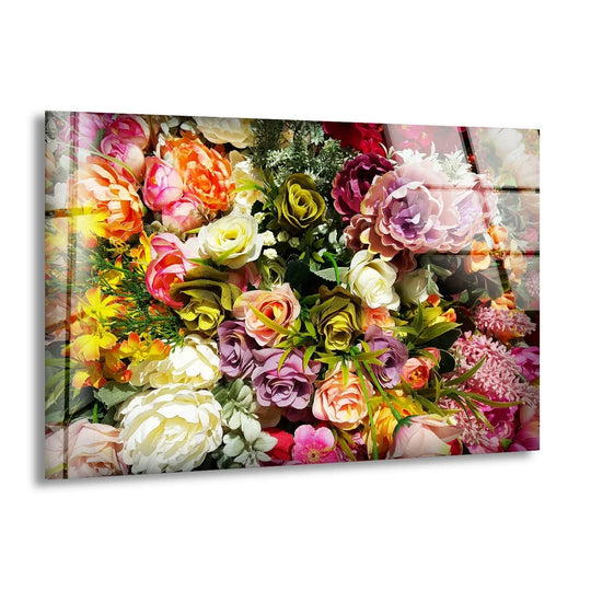 A mixed flowers glass wall art decor piece features blooming flowers with geometric reflections from its glass surface.