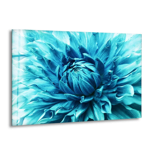 Close-up focus on the intricate turquoise petals of a dahlia flower forming a captivating glass wall art piece.