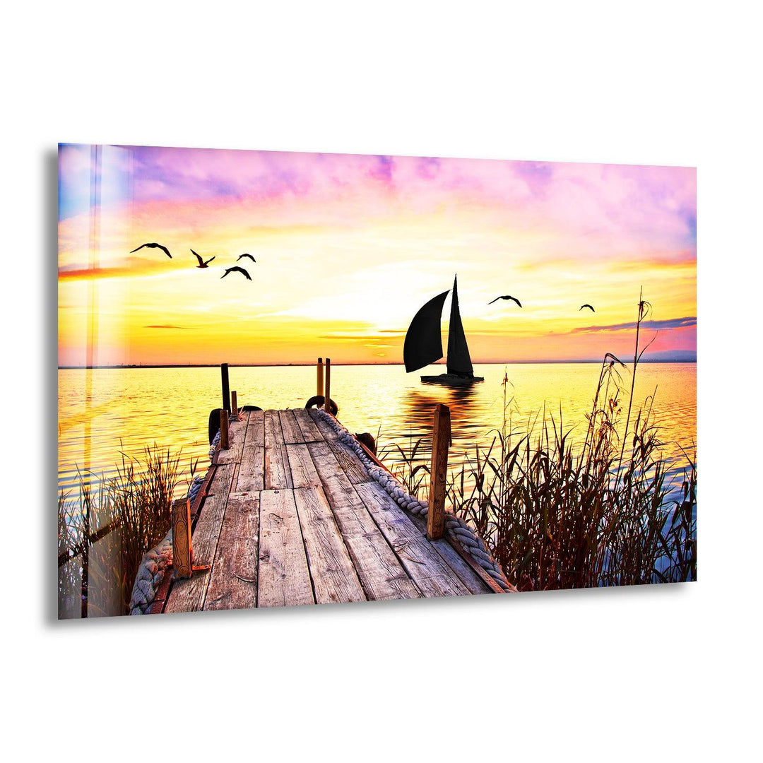 Sunset Pier and Sailboat Glass Wall Art – A Serene Coastal Escape
