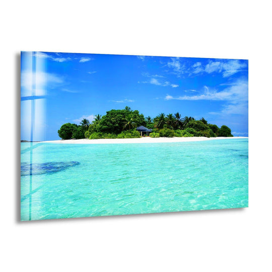 Sandy Island in The Ocean glass wall art shows an island and tropical ocean in shades of blue and green and it's perfect for landscape art lovers and ocean painting collectors