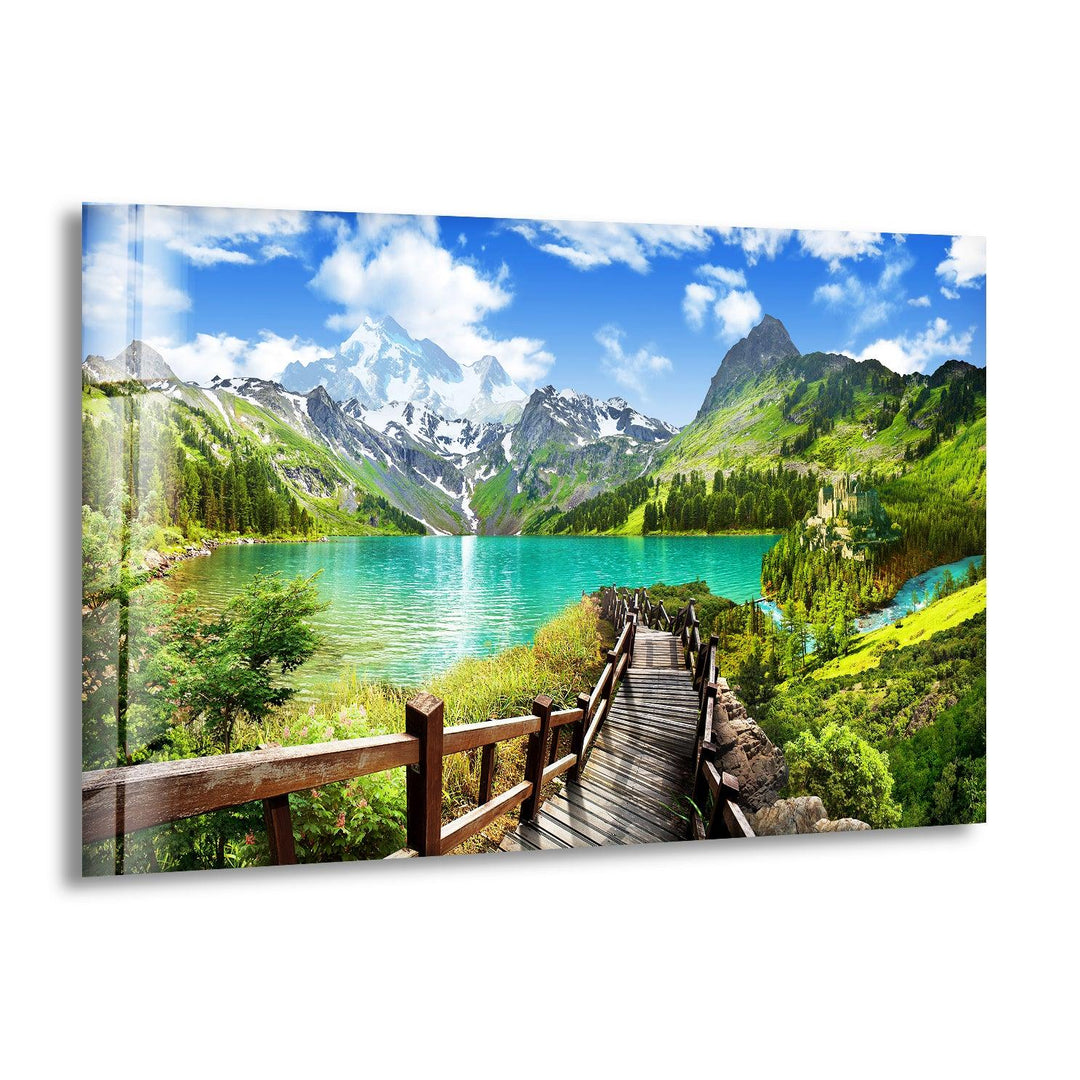 Stunning mountain lake with a wooden pathway, printed on glass wall art.
