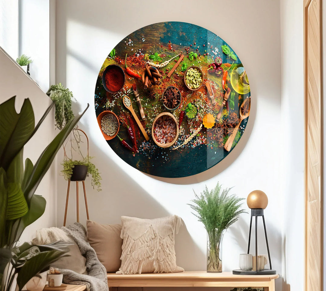Colorful spices and herbs glass wall art displayed above a sofa features a vibrant teal background with red and green accents for rustic kitchen decor.