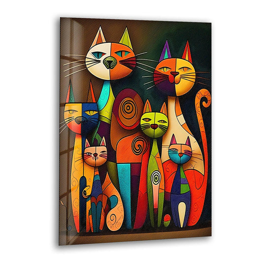 Dominant in orange and blue, this vibrant glass wall art decor features a family of colorful, abstract cats with geometric patterns.