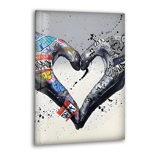A minimalist, splattered white background frames this cool urban glass art, creating a dramatic contrast with the graffiti heart.