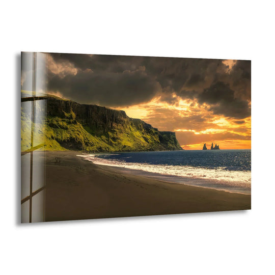 The realistic detail of this Sunset Cliffs coastal landscape glass print captures an Icelandic beach sunset, adding distinct home decor.