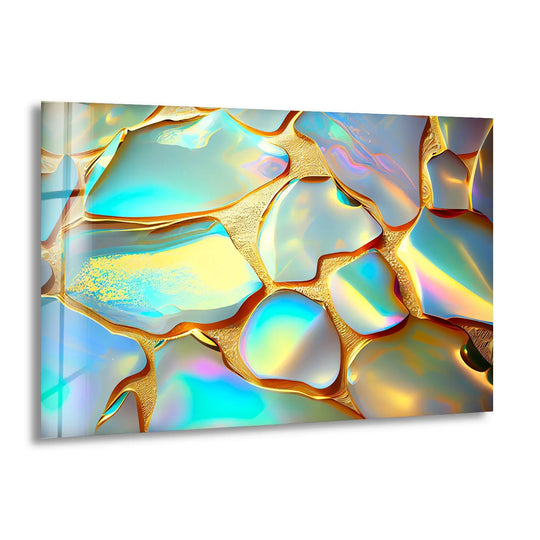 A cool-toned glass wall art decor featuring iridescent blues and vibrant rainbow hues captured in abstract shapes.