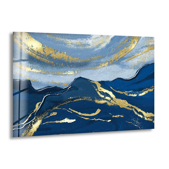 Blue and gold abstract glass wall art displays a layered ocean wave effect, making it a unique modern wall decor.