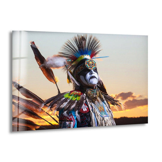 Vibrant Native American abstract glass wall art showcases striking color contrast with a striking headdress against a warm sunset background, a piece of best glass art.