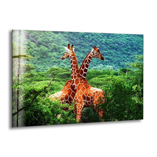 A serene glass art painting captures two giraffes standing still amidst lush green forest foliage.