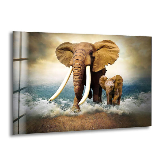 Ocean Elephants glass wall art shows wildlife art and a beach scene with blue water and is a peaceful elephant animal art piece