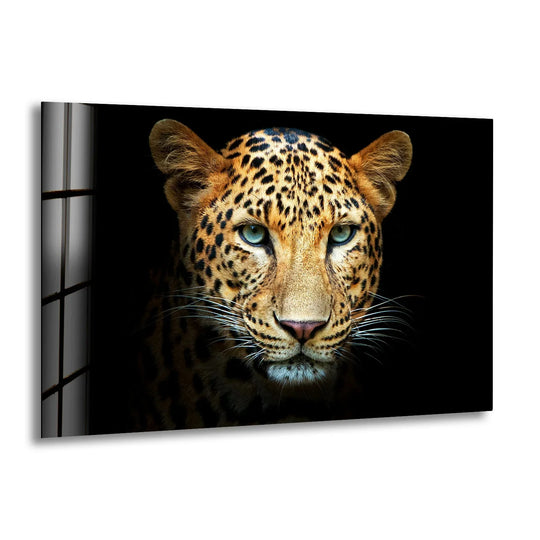 A striking leopard's face glows with jewel-toned eyes on this vibrant glass wall artwork.