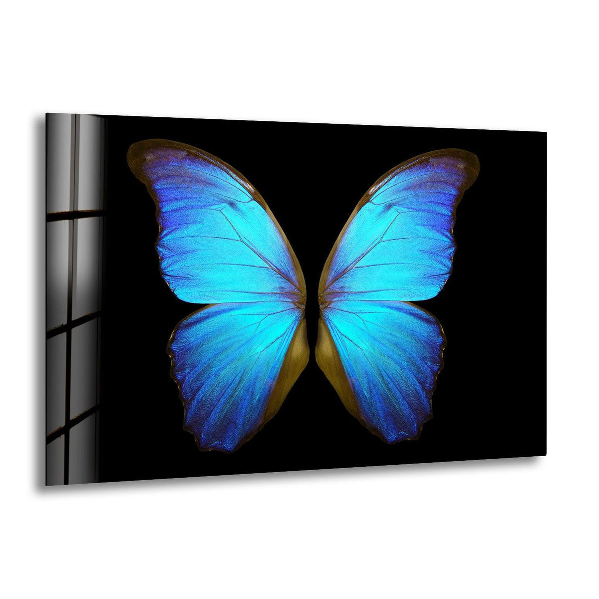 Smooth, iridescent blue butterfly wings shimmer with intricate texture on this piece of art from glass.