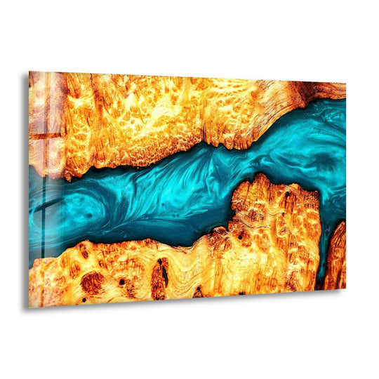 A geometric abstract glass art painting features flowing azure epoxy between golden wood textures.