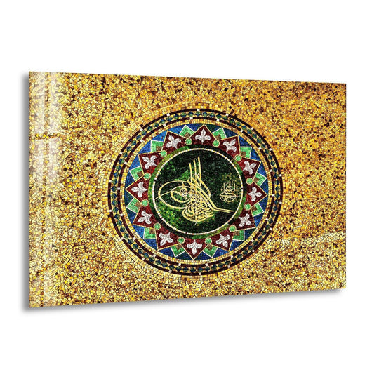 Exuding intense color saturation, this Ottoman Tughra art from glass features a vibrant, circular mosaic design with striking greens, blues, and reds.