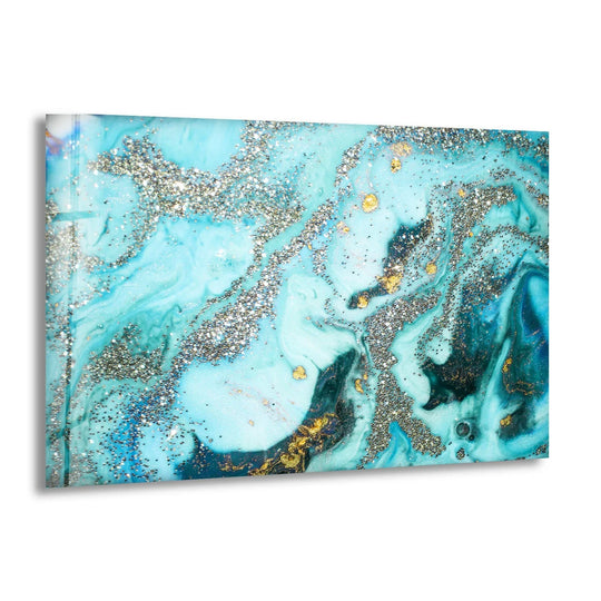Fluid swirls of turquoise and sapphire mingle with shimmering silver and gold in this stunning glass art, evoking organic forms.