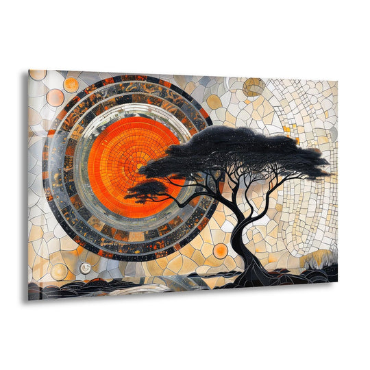 A horizontal rectangular glass wall art piece features a circular mosaic design on the left and a silhouetted tree on the right.