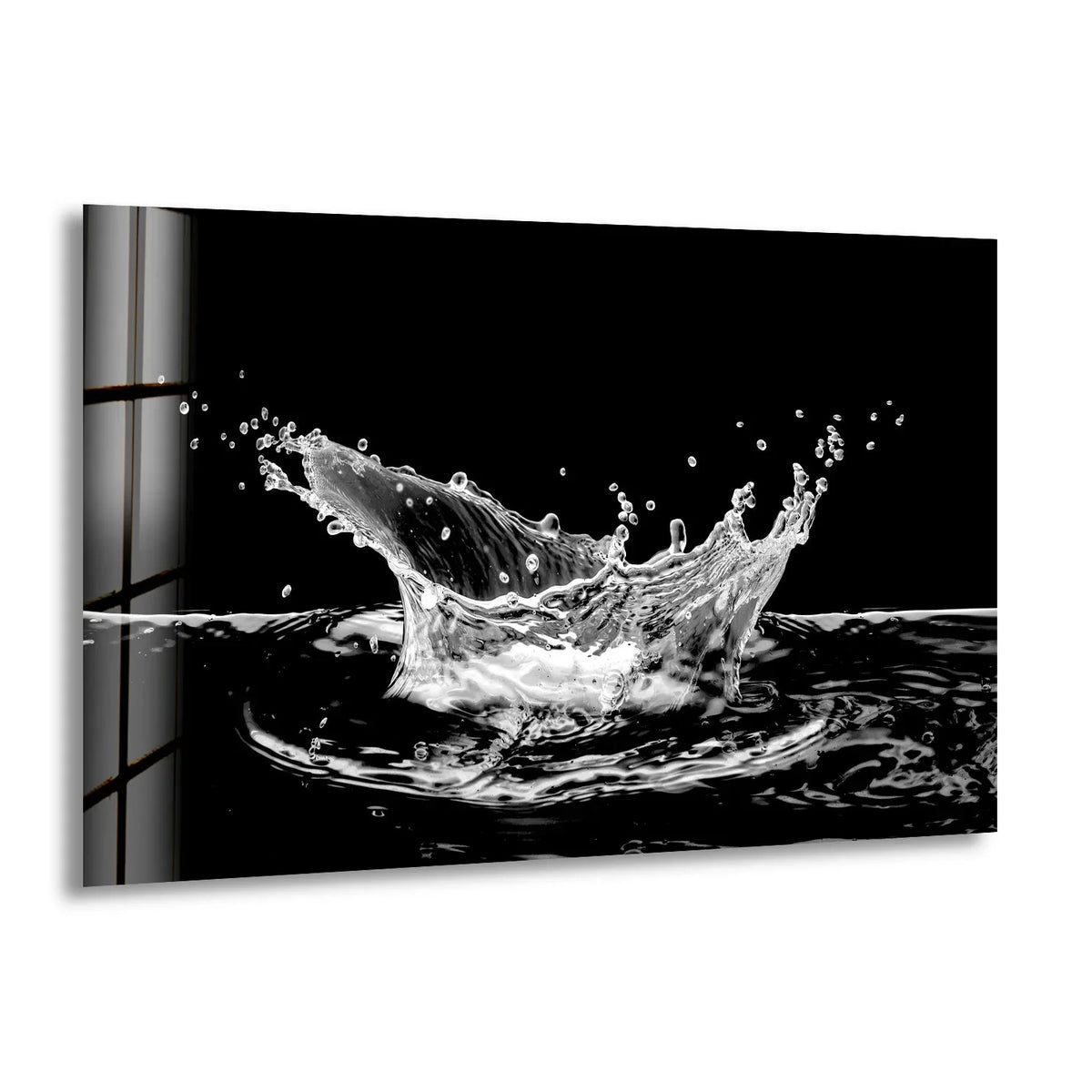 A dramatic water splash frozen in motion on art from glass, showcasing the dynamic texture of liquid.