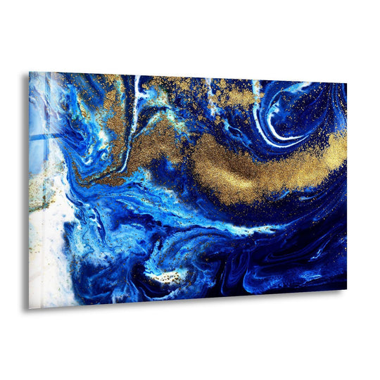 Swirling organic forms in navy and sapphire blues meld with streaks of gold, a captivating piece of art from glass.