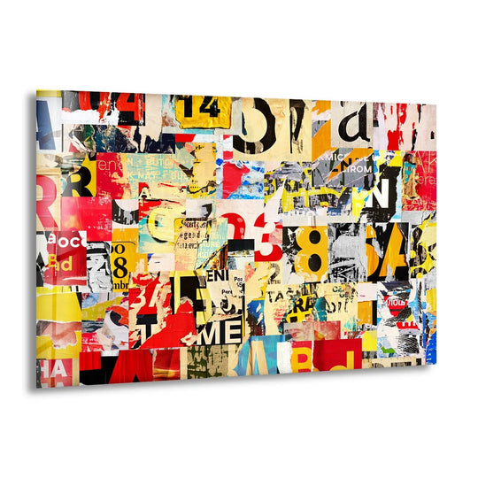 A vivid glass wall art piece with a collage of torn paper and bold typography creating a dynamic focal point for decorative wall art.