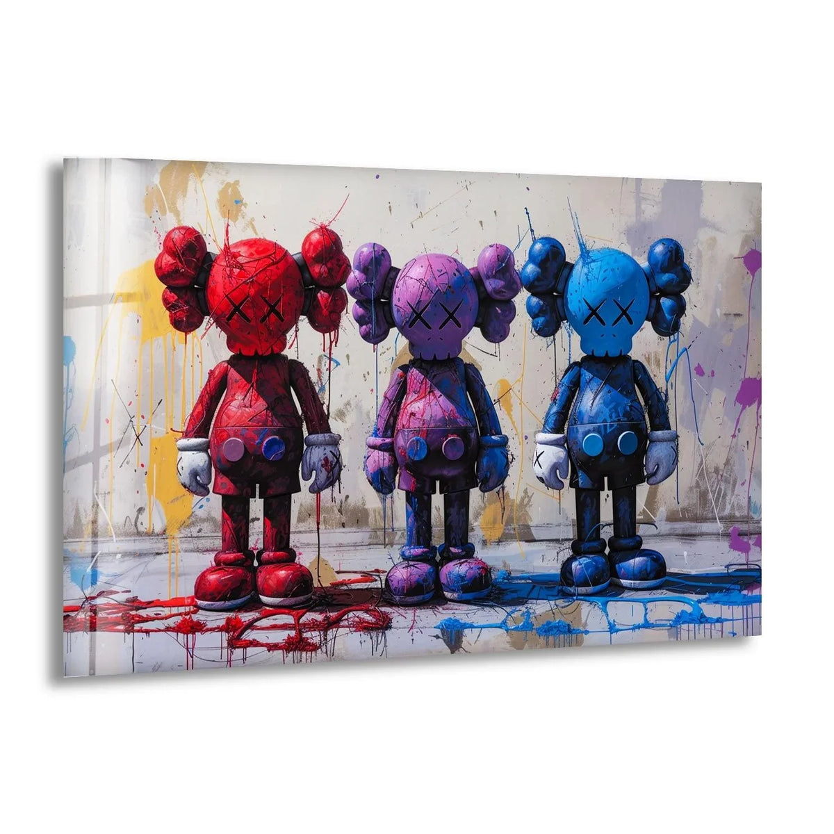 Bright yellow paint splatters highlight this striking glass art of three colorful KAWS figures.
