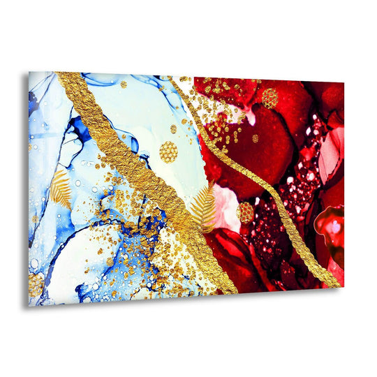 Close-up view of shimmering gold leaf and bold strokes on a red and blue glass art painting.