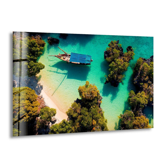 The brightest area highlights the shimmering turquoise waters surrounding a wooden boat and rocky islets in this captivating tropical lagoon hanging wall art.