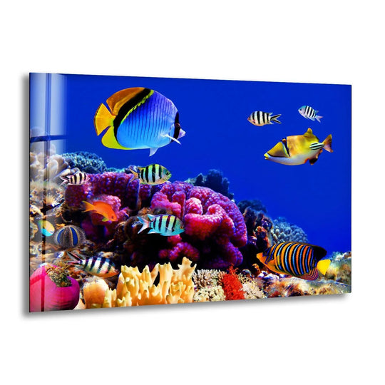 Vibrant tropical aquarium coral reef glass wall artwork transitions from deep blues to bright oranges and yellows.
