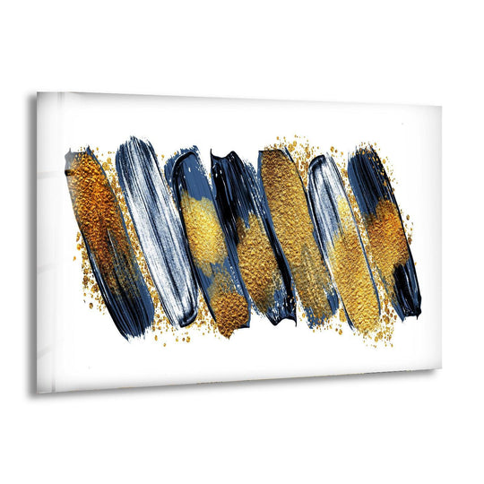 Bold navy brush strokes with shimmering gold glitters create striking color contrast on this abstract glass wall art print.