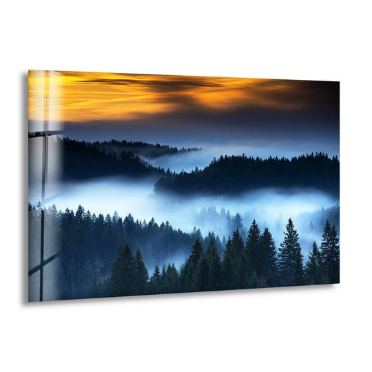 Foggy Rainforest glass wall art shows forest landscape and trees under gold sky and is forest wall art for a serene glass print home decor