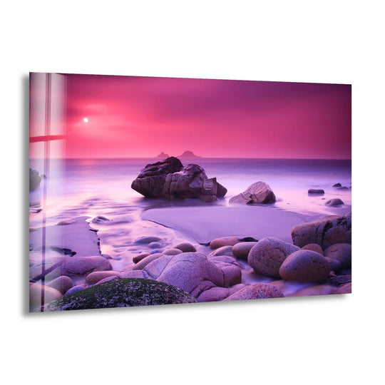 Smooth surface texture defines this pink sunset beach glass art painting, illustrating the dreamy coastal landscape and smooth coastal rocks reflecting the sunset.