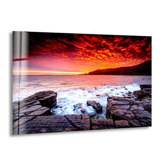Landscape glass wall art sky red at night and fiery sunset wall art captures a vibrant and breathtaking beauty of sunset over rugged coastline