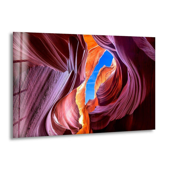 Stunning decorative wall art showcases the smooth, polished finish of glass capturing the vibrant, layered textures of Lower Antelope Canyon.