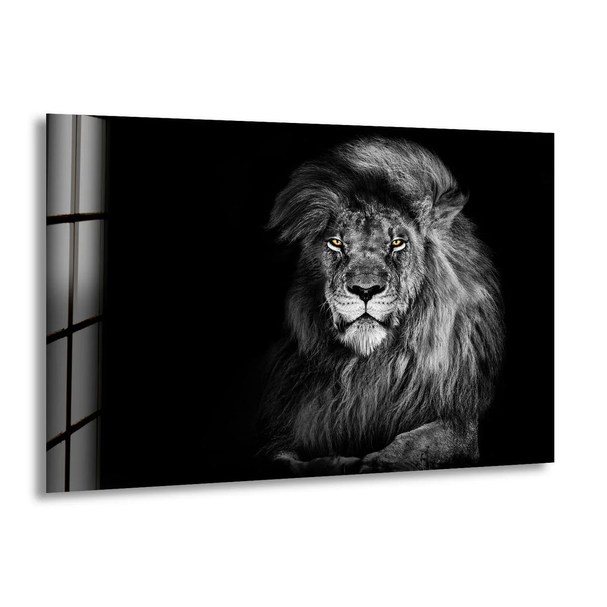 A majestic lion art from glass is set against a stark, black background with faint light from a grid-like window on the left.