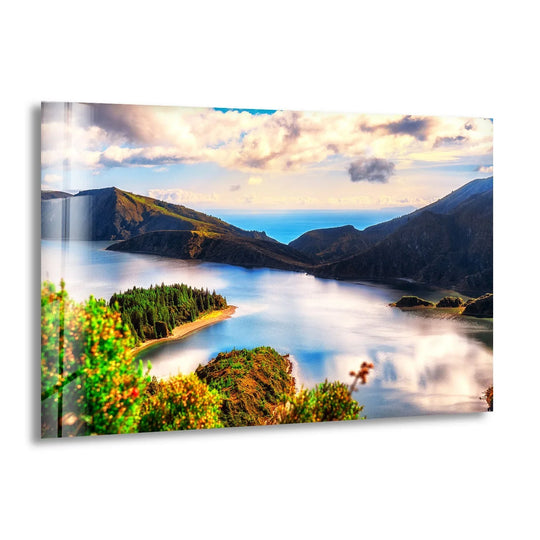Azure dominates this Lagoa do Fogo nature scene, a stunning print wall art piece showcasing the serene lake surrounded by lush green landscapes and a cloudy sky.