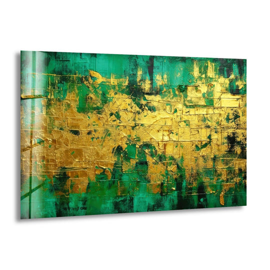 The brightest area of the abstract art from glass features a textured expanse of shimmering gold and emerald green.