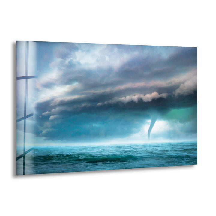 A dramatic storm brewing over the ocean with a powerful waterspout.
