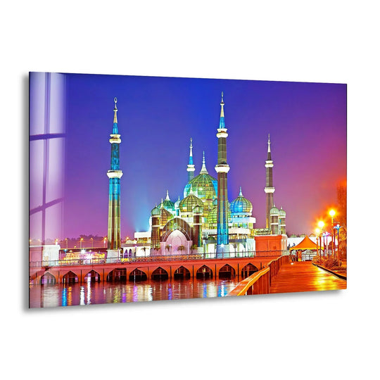 Reflections of the Crystal Mosque shimmer as decorative wall art, softly illuminating the water beneath its striking glass architecture in a display of Islamic elegance.