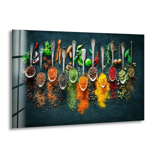 Horizontal glass wall art displaying colorful spices arranged in vintage spoons against a dark teal background perfect for kitchen decor.