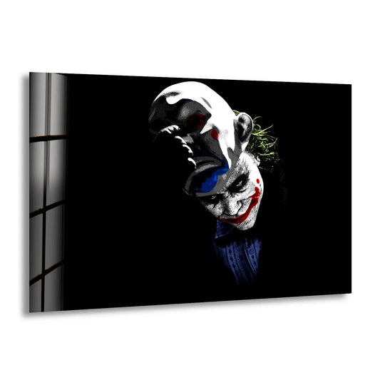 Illuminated by light, the clown mask stands out in this minimalist glass wall art prints, a dark dual-face design that adds a dramatic touch.