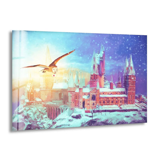 Hogwarts castle gleams in the snow as the sun casts a warm glow, creating a magical home decoration on this sunlit castle glass wall art.