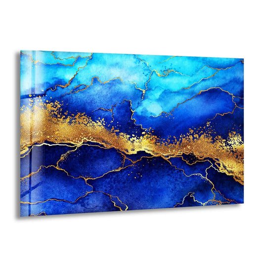Abstract glass wall art decor showcases organic, flowing sapphire and navy blue watercolor forms intersected by shimmering gold veins.