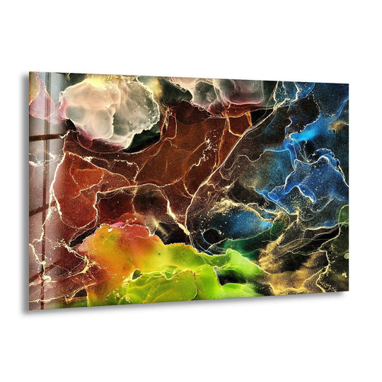 An abstract glass art piece showcasing a vibrant transition from earthy browns and fiery oranges to lush greens and deep blues.