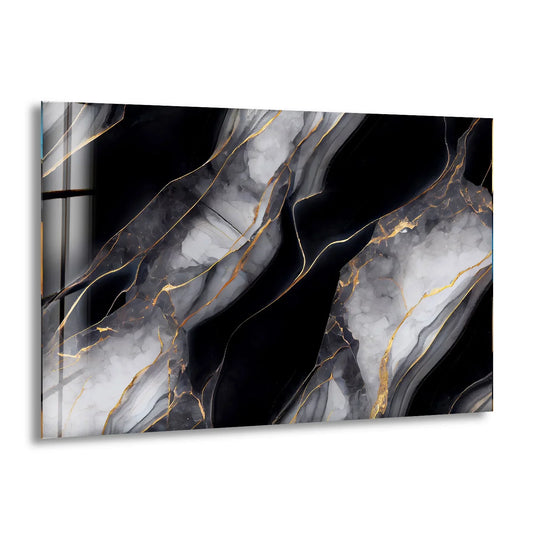 A serene black and gold onyx abstract glass art piece evokes a sense of quiet elegance and stillness.