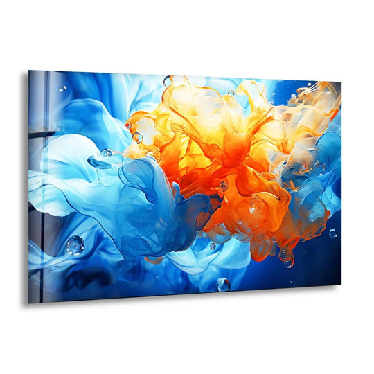 Smooth, glossy glass wall art decor showcases swirling, translucent clouds of sapphire and amber ink with a polished, reflective finish.